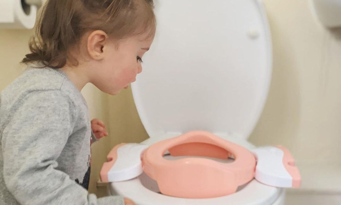 Potette Plus 2 in 1 on the toilet