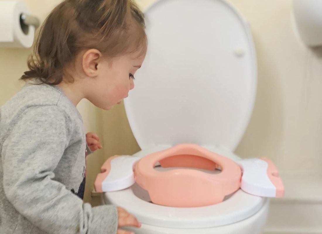Potette Plus 2 in 1 on the toilet